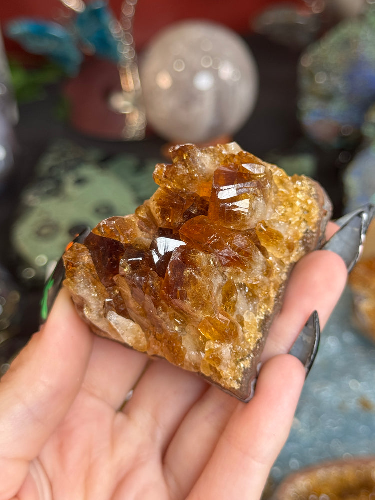 Raw quartz cluster on weathered wood