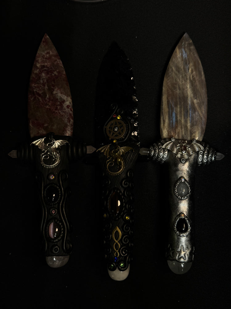 Carved crystal skulls and figures